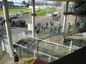 A wide shot of metal stairs outside a building.