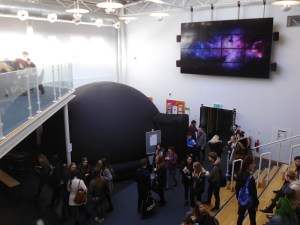 A large black igloo-like structure